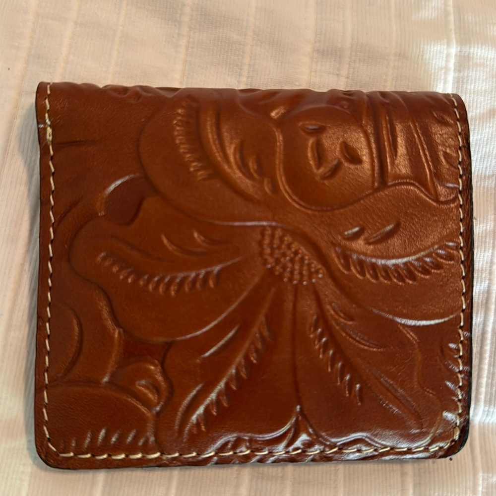 Patricia Nash gently used leather small wallet. 4” by 3 1/2.